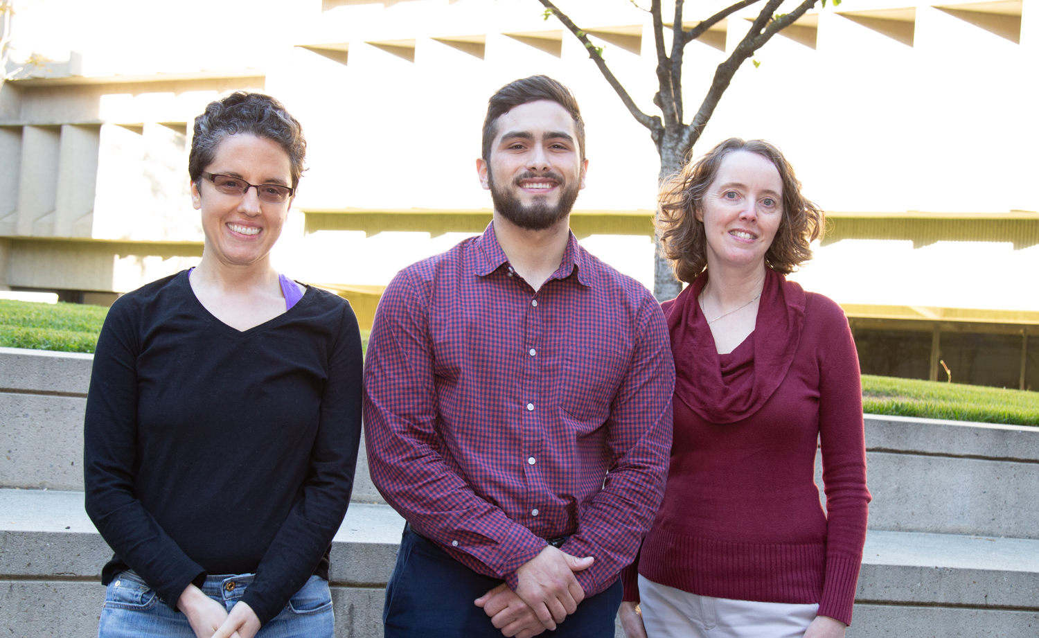 Christopher Lopez poses with BUSP staff