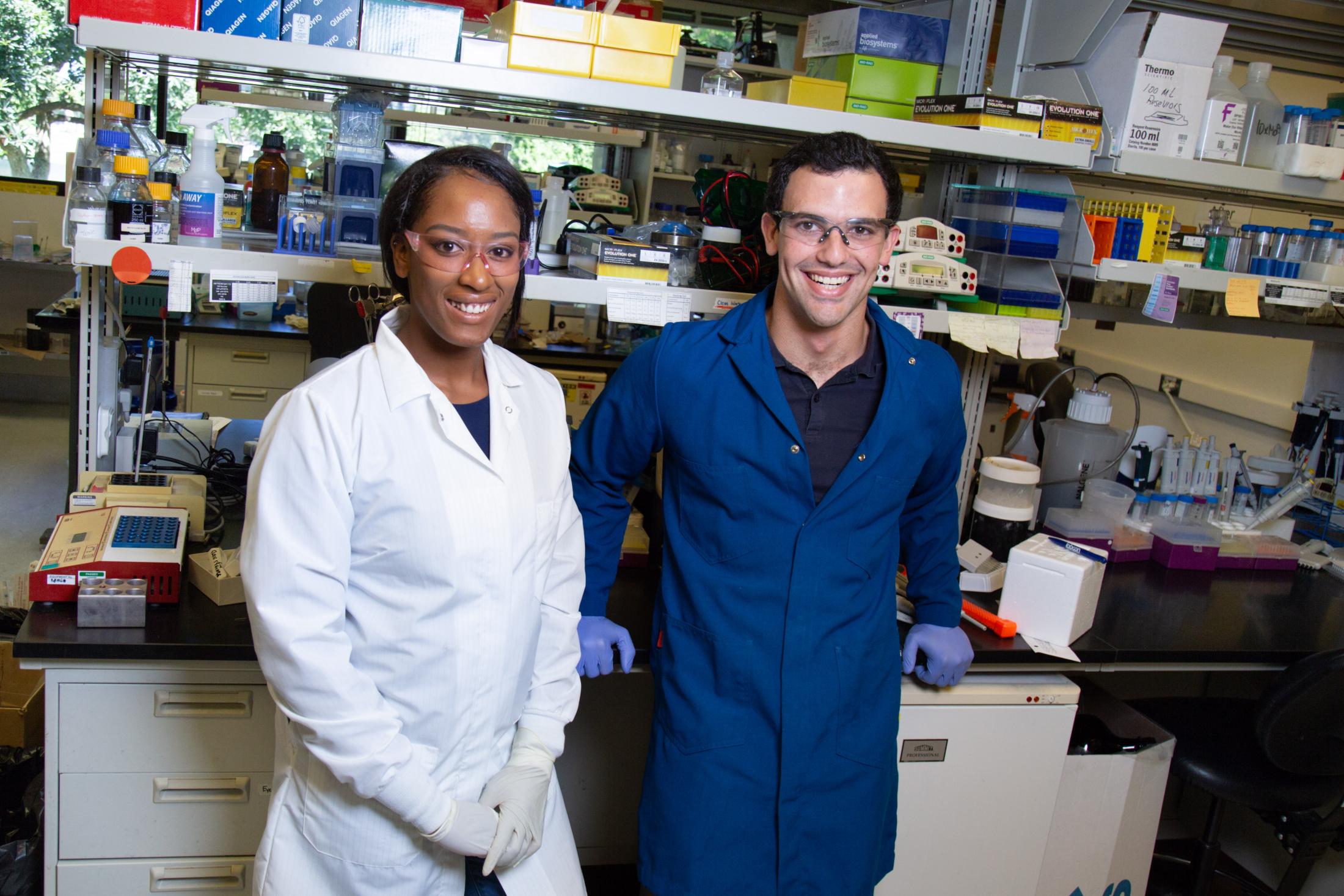 Tayler Smith and Leib Lipowsky stand in the lab. David Slipher/UC Davis