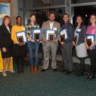 UC Davis’ new CAMPOS Faculty Scholars (holding certificates and plaques), from left, Maureen Njoki Kinyua, Rebecca Hernandez, Jesús M. Velázquez, Samuel Díaz-Muñoz, Jeanette Ruiz and Verónica Martínez-Cerdeño. They are flanked by, from far left, Linda P.B. Katehi, chancellor emerita and UC Davis ADVANCE principal investigator; Karen McDonald, faculty director and co-principal investigator; and Mary Lou de Leon Siantz, CAMPOS founding director; and, at far right, 2015 CAMPOS Faculty Scholars Alexis Patterson