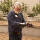 Man standing outside with a prosthetic arm